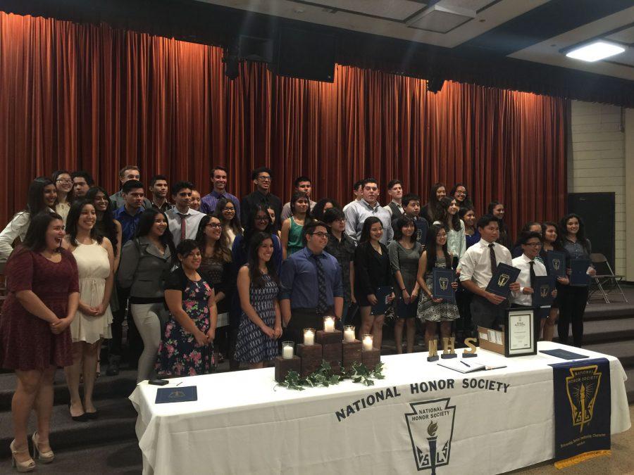 The candles were lit for the candle lit ceremony. Don Lugo students eagerly await to be officially accepted into the National Honors Society. 