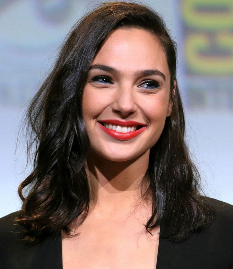 Gal Gadot poses at Comic Con for the announcement of the new Wonder Woman movie.  The movie is said to be released June 2, 2017. Which is only five months before the release of Justice League: Part One an movie featuring Superman, Batman, and Wonder Woman. 