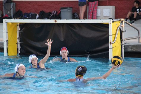 Lady Qs trying to defend their goal during the intense game. For some of the players, this is their first time in CIF. The Lady Qs are definitely looking forward to their next season! 