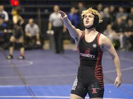 Here is a picture of Mark Beggs celebrating his victory at the Texas state wrestling finals. Photo from public domain. 