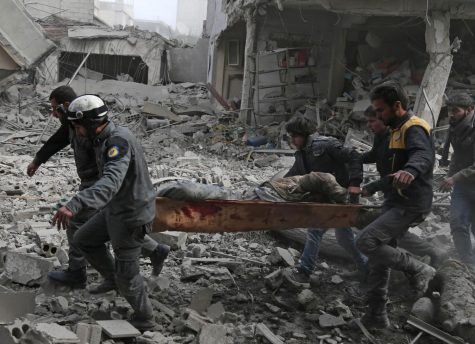 Destruction litters the street of Eastern Ghouta as Syrian president, Bashar al-Assad, orders air strike attacks and bombings on innocent lives. Picture from Public Domain.
