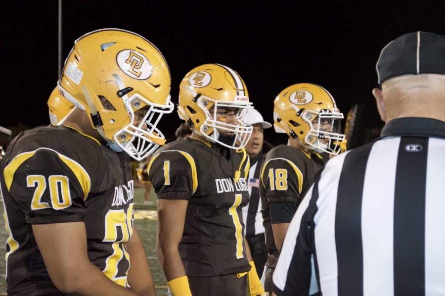 Don Lugo football captains during coin toss before game. It was just a strong effort from us out there. -Coach Gano