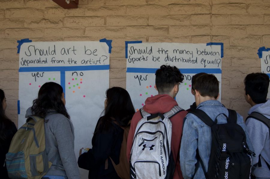 The attention of the students were captured. Wondering what these might be, students gathered in groups to see what the posters were saying and why they were saturated in the quad. Something sparked their interest, but it was enough to get them to vote YES or NO