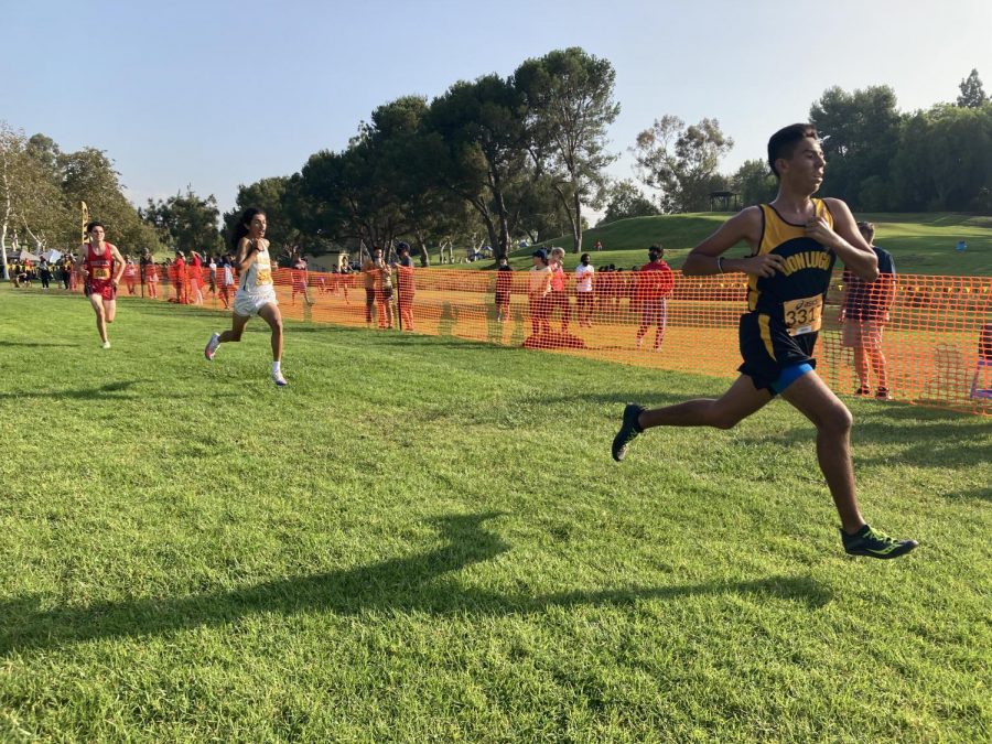 Robbie Valdez taking the run smoothly through the start. Cross country continues to push through the race coming in with a win. At this point its not really going for medals. Its going for time, stated by Robbie Valdez.