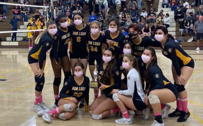 The Don Lugo Girls Volleyball team with the Queens of the Court Trophy after beating rival, Chino High on Senior Night. 