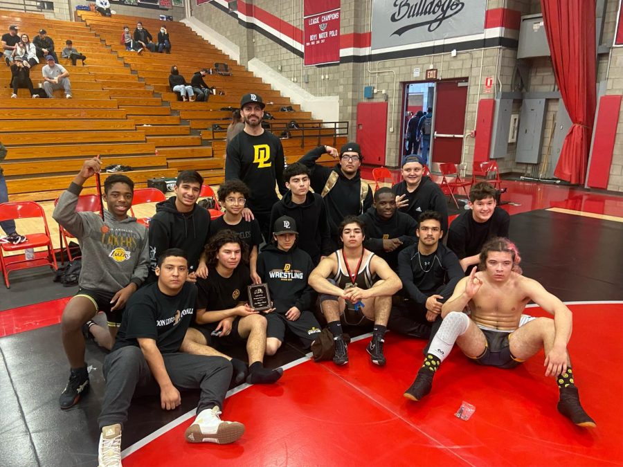 Don+Lugo+Wrestling+posing+for+a+photo+after+their+performance+at+Ayala+High+School.+What+drives+us+on+the+mat+is+a+CIF+championship%2C+stated+Will+Young.++