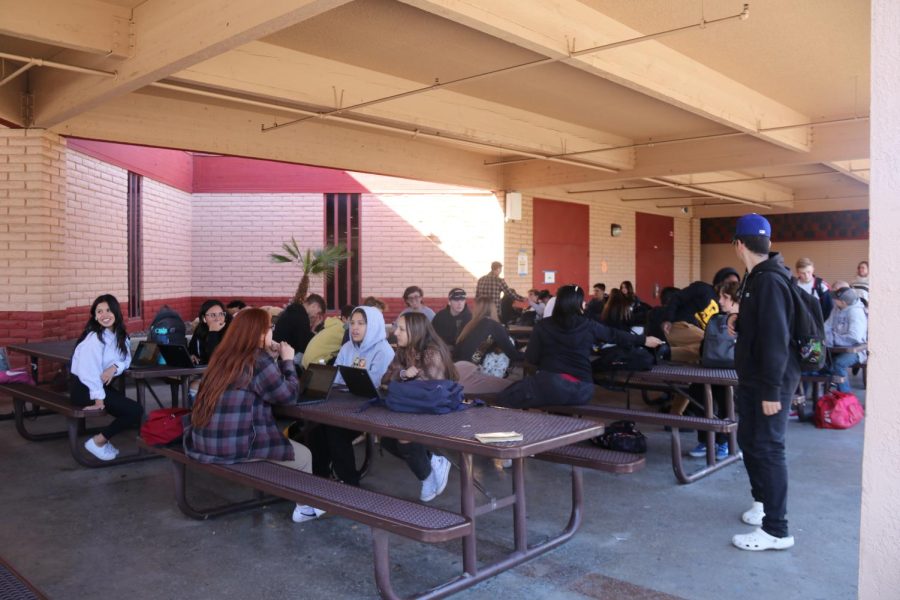 Don Lugo students are seen sitting down at the lunch tables protesting the mask mandate. Teachers and other staff have told me and other students that they can not sustain this for a long period of time, and have told us they will put us on independent study, said Wyatts Biggs.