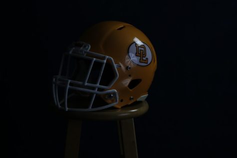 Football photo illustration Photographed in our studio of a Don Lugo Varsity helmet.