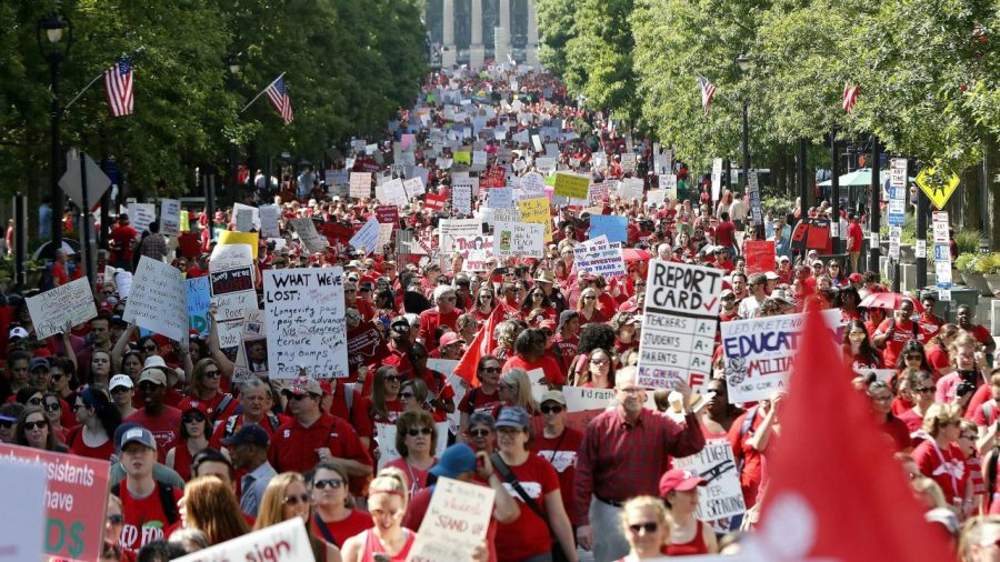 Thousands of North Carolina teachers and other school employees march in Raleigh on Wednesday.
