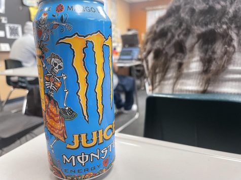 Some students have energy drinks to keep them awake in the morning.