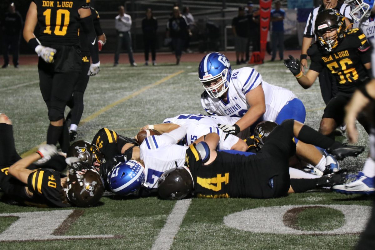 Don+Lugo+wide+receiver+being+tackled.