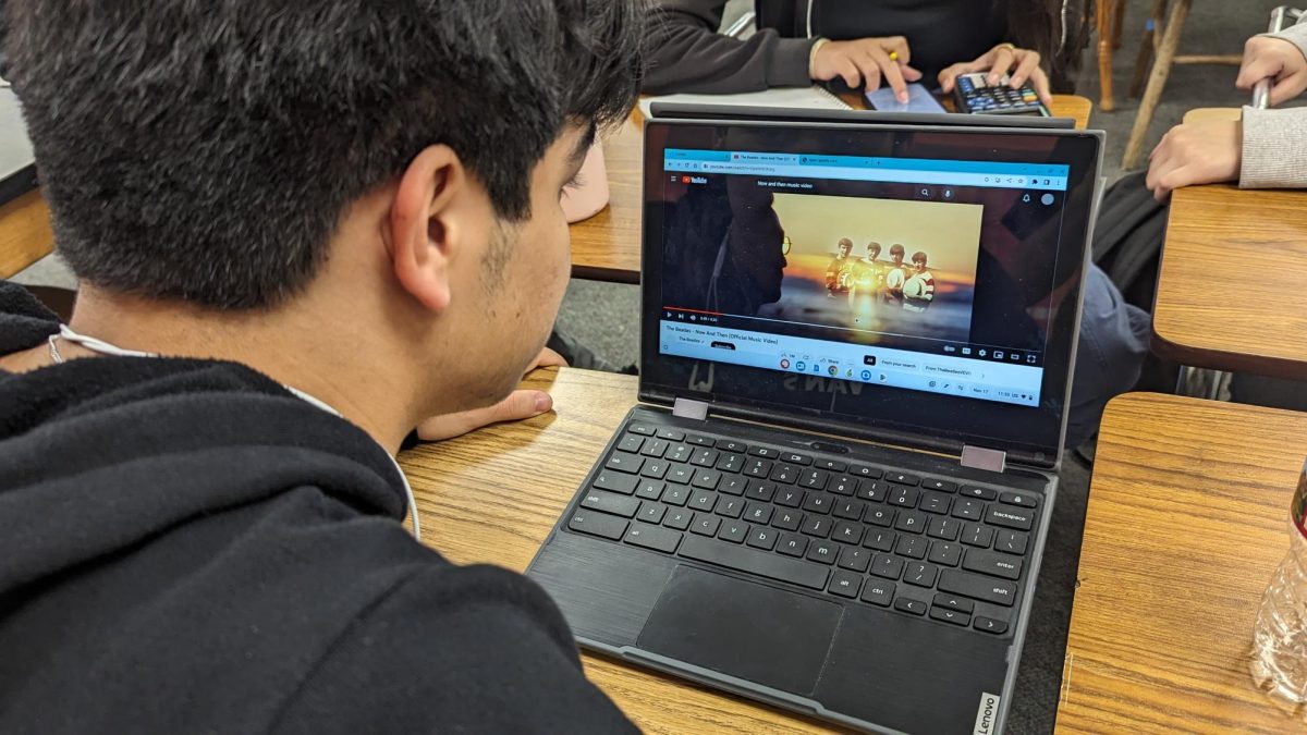 DLHS senior Marcos Ramirez watching the Now And Then music video