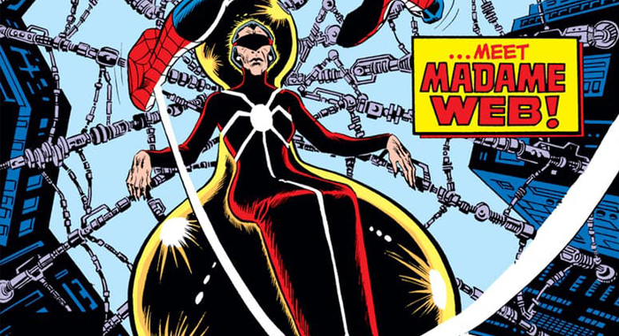 Madame Web sitting in her chair with her glasses using her web to sense everything around her. 